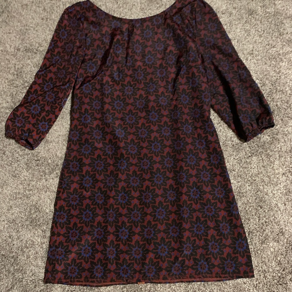 Francesca’s floral print silky dress.